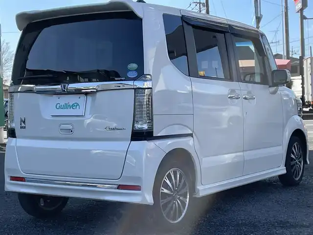 ホンダ Ｎ ＢＯＸ カスタム G ターボ Lパッケージ 岩手県 2015(平27)年 7.3万km プレミアムホワイトパールⅡ ・ワンオーナー/・４WD/・ターボ車両/・純正ナビフルセグTV/・BT　　DVD/・バックカメラ/・ETC/・クルーズコントロール/・パドルシフト/・ECON/・ハーフレザーシート/・シートヒーター/・両側パワースライドドア/・オートライト/・HIDヘットライト/・LEDフォグライト/・オートリトラミラー/・ウインカーミラー/・純正１５インチアルミ/・スマートキー×３/・プッシュスタート/・保証書/・取説