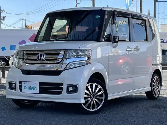 ホンダ Ｎ ＢＯＸ カスタム G ターボ Lパッケージ 岩手県 2015(平27)年 7.3万km プレミアムホワイトパールⅡ ・ワンオーナー/・４WD/・ターボ車両/・純正ナビフルセグTV/・BT　　DVD/・バックカメラ/・ETC/・クルーズコントロール/・パドルシフト/・ECON/・ハーフレザーシート/・シートヒーター/・両側パワースライドドア/・オートライト/・HIDヘットライト/・LEDフォグライト/・オートリトラミラー/・ウインカーミラー/・純正１５インチアルミ/・スマートキー×３/・プッシュスタート/・保証書/・取説