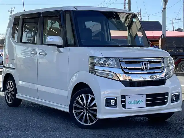 ホンダ Ｎ ＢＯＸ カスタム G ターボ Lパッケージ 岩手県 2015(平27)年 7.3万km プレミアムホワイトパールⅡ ・ワンオーナー/・４WD/・ターボ車両/・純正ナビフルセグTV/・BT　　DVD/・バックカメラ/・ETC/・クルーズコントロール/・パドルシフト/・ECON/・ハーフレザーシート/・シートヒーター/・両側パワースライドドア/・オートライト/・HIDヘットライト/・LEDフォグライト/・オートリトラミラー/・ウインカーミラー/・純正１５インチアルミ/・スマートキー×３/・プッシュスタート/・保証書/・取説