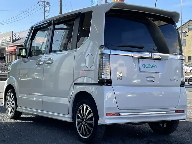 ホンダ Ｎ ＢＯＸ カスタム G ターボ Lパッケージ 岩手県 2015(平27)年 7.3万km プレミアムホワイトパールⅡ ・ワンオーナー/・４WD/・ターボ車両/・純正ナビフルセグTV/・BT　　DVD/・バックカメラ/・ETC/・クルーズコントロール/・パドルシフト/・ECON/・ハーフレザーシート/・シートヒーター/・両側パワースライドドア/・オートライト/・HIDヘットライト/・LEDフォグライト/・オートリトラミラー/・ウインカーミラー/・純正１５インチアルミ/・スマートキー×３/・プッシュスタート/・保証書/・取説