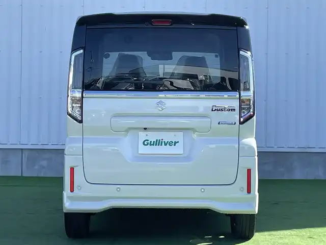 スズキ スペーシア カスタム HYBRID XS 香川県 2025(令7)年 0.1千km ピュアホワイトパール/ブラック2トーン 届出済未使用車/全方位モニター付きメモリーナビゲーション/　スズキコネクト対応通信機/→9インチHDディスプレイ/フルセグ/AM/FM/Bluetooth/→AppleCarPlay/AndroidAuto/USB/スズキセーフティサポート/・デュアルセンサーブレーキサポートII/・アダプティブクルーズコントロール（全車速追従機能付）/・標識認識機能/・車線逸脱抑制機能/・誤発進抑制機能(前後)/・後退時ブレーキサポート/・ふらつき警報機能/・横滑り防止装置/・ハイビームアシスト/LEDヘッドライト/ハーフレザーシート/前席シートヒーター/両側パワースライドドア/ヘッドアップディスプレイ/スリムサーキュレーター/革巻きステアリング/ステアリングリモコン/ステアリングヒーター/シートバックテーブル/リアサンシェード/純正15インチアルミ/スマートキー/プッシュスタート