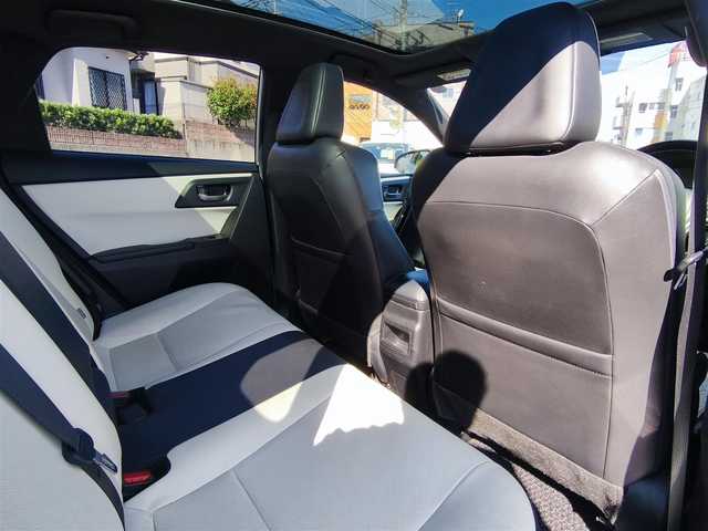 トヨタ オーリスハイブリッド Gパッケージ 熊本県 2016(平28)年 11.5万km ホワイトパールクリスタルシャイン パノラマルーフ/純正9インチナビ（NSZT-Y64T）/【フルセグTV/Bluetooth/CD/DVD】/バックカメラ/クルーズコントロール/プリクラッシュセーフティー/先行車発進お知らせ/レーンキープアシスト/オートLEDライト/ホワイトハーフレザーシート/前席シートヒーター/革巻きステアリング/ステアリングスイッチ/純正１７インチAW/ETC/純正フロアマット/横滑り防止装置/ABS/保証書/取扱説明書/スペアキー