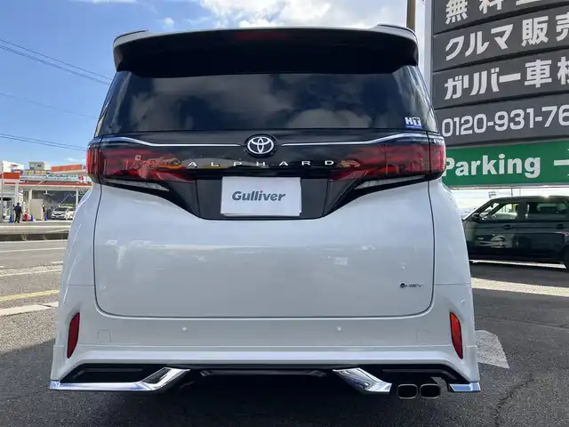 トヨタ アルファードハイブリット Z 広島県 2024(令6)年 0.3万km プラチナホワイトパールマイカ 法人ワンオーナー/モデリスタエアロ/黒革シート/左右独立ムーンルーフ/トヨタチームメイト/左右ユニバーサルステップ/デジタルインナーミラー/純正ナビ/パノラミックビューモニター/純正フリップダウンモニター/カラーヘッドアップディスプレイ/両側パワースライドドア/シートヒーター（全席）/パワーシート（前席・2列目）/ベンチレーションシート（前席）/セーフティセンス/レーダークルーズ/パドルシフト/置くだけ充電/フルセグ・Bluetooth/ブラインドスポットモニタリング/ビルトインETC2.0/電子取扱説明書/新車保証書/スペアキー