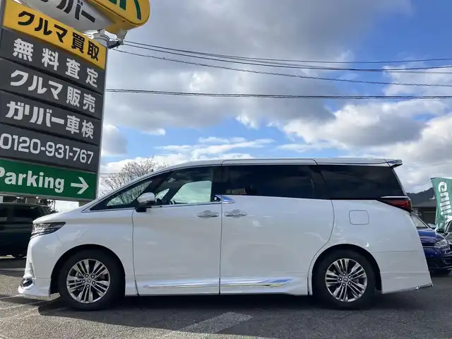 トヨタ アルファードハイブリット Z 広島県 2024(令6)年 0.3万km プラチナホワイトパールマイカ 法人ワンオーナー/モデリスタエアロ/黒革シート/左右独立ムーンルーフ/トヨタチームメイト/左右ユニバーサルステップ/デジタルインナーミラー/純正ナビ/パノラミックビューモニター/純正フリップダウンモニター/カラーヘッドアップディスプレイ/両側パワースライドドア/シートヒーター（全席）/パワーシート（前席・2列目）/ベンチレーションシート（前席）/セーフティセンス/レーダークルーズ/パドルシフト/置くだけ充電/フルセグ・Bluetooth/ブラインドスポットモニタリング/ビルトインETC2.0/電子取扱説明書/新車保証書/スペアキー