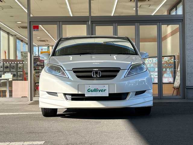 ホンダ エディックス 20X 埼玉県 2005(平17)年 7.1万km プレミアムホワイトパール ワンオーナー/Moduloエアロ(フロント、サイド、リア)/純正HDDナビゲーション(VXH-052CV)/　　CD/DVD/フルセグ/SRSエアバック（運転席、助手席）/Gコントロール技術/3点式ELR/ALRシートベルト/純正16インチアルミホイール/ブレーキアシスト/セキュリティアラーム、イモビライザー/オートエアコン/純正フロアマット/ETC/取扱説明書/保証書/記録簿/スペアキー/禁煙車