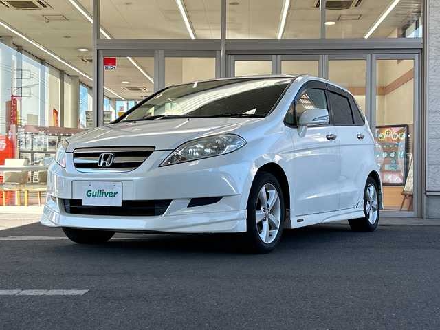 ホンダ エディックス 20X 埼玉県 2005(平17)年 7.1万km プレミアムホワイトパール ワンオーナー/Moduloエアロ(フロント、サイド、リア)/純正HDDナビゲーション(VXH-052CV)/　　CD/DVD/フルセグ/SRSエアバック（運転席、助手席）/Gコントロール技術/3点式ELR/ALRシートベルト/純正16インチアルミホイール/ブレーキアシスト/セキュリティアラーム、イモビライザー/オートエアコン/純正フロアマット/ETC/取扱説明書/保証書/記録簿/スペアキー/禁煙車