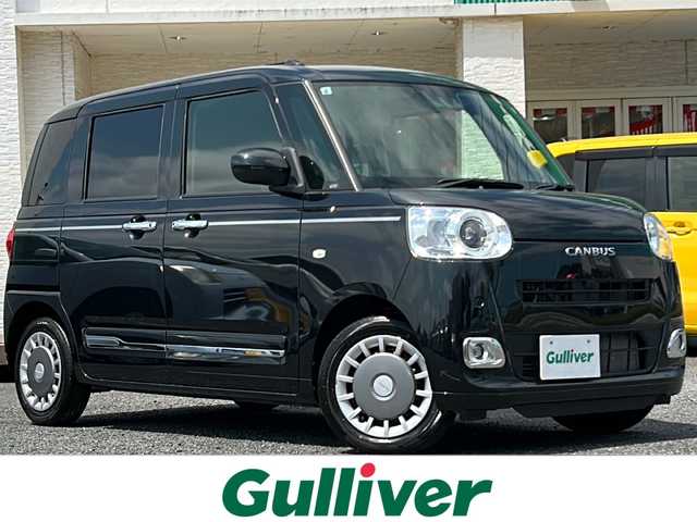 ダイハツ ムーヴ キャンバス セオリー G ターボ 千葉県 2022(令4)年 1.6万km ブラックマイカメタリック ナビNMZK-W72W　バックカメラ　衝突軽減ブレーキ　ＥＴＣ　両側パワースライドドア　シートヒーター　　クルコン　ホッとカップホルダー　タッチ＆ゴーロック機能　ＬＥＤ　オートライト　　ターボ/純正ナビ（NMZK-W72D)/CD/DVD/フルセグTV/Bluetooth/USB/SD/AM/FM/バックカメラ /スマートアシスト/・衝突回避支援ブレーキ/・衝突警報機能/・ブレーキ制御付誤発進抑制機能/・車線逸脱抑制制御/警報機能/・路側逸脱警報機能/・ふらつき警報/・先行車発進お知らせ機能/・標識認識機能/・オートハイビーム/・アダブティブドライビングビーム/・サイドビューランプ/クルーズコントロール/コーナーセンサー/ホッとカップホルダー/両側パワースライドドア /タッチ&ゴーロック機能/シートヒーター /革巻きステアリング/ステアリングリモコン/ステアリングチルド機構/純正フロアマット/LEDフォグ（メッキガーニッシュ付）/ドアアウターハンドル（メッキ）/メッキ調ピンストライプ/メッキサイドガーニッシュ/メッキリアバンパーモール