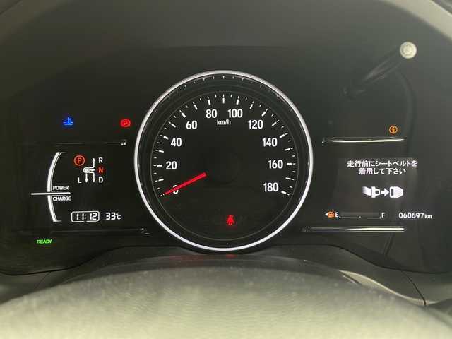ホンダ ヴェゼル ハイブリッド RS ホンダセンシング 鹿児島県 2018(平30)年 6.1万km プラチナホワイトパール 禁煙車/社外メモリナビ/(CD/DVD/BT/フルセグ)/バックカメラ/ビルトインＥＴＣ/ハーフレザーシート/シートヒーター/パドルシフト/ドライブレコーダー/電動パーキング/ブレーキホールド/衝突軽減ブレーキ/レーダークルーズコントロール/レーンキープアシスト/スマートキー/スペアキー
