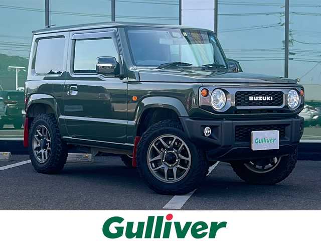 スズキ ジムニー XC 福岡県 2022(令4)年 2.5万km ジャングルグリーン 社外７インチメモリナビ（CN-HE01WD）/（AM/FM/CD/DVD/BT/フルセグTV）/クルーズコントロール/シートヒーター/バックカメラ/背面タイヤ/衝突被害軽減システム/横滑り防止装置/アイドリングストップ/プッシュスタートボタン/スマートキー/純正１６インチアルミホイール/純正LEDヘッドライト/純正フロアマット/ドライブレコーダー（SDカード未挿入）/ETC