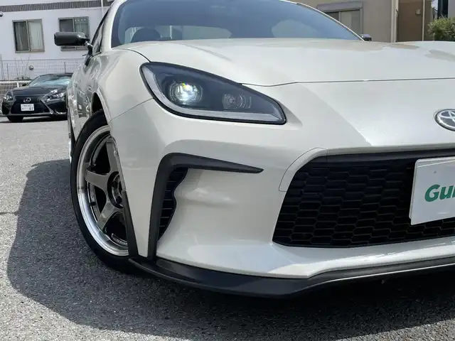 トヨタ ＧＲ８６ RC 神奈川県 2023(令5)年 1.1万km クリスタルホワイトパール ワンオーナー/ADVAN Racing17インチAW/STIサスペンション/VOLTEXカーボンリヤウイング/HKSマフラー/HKSオイルクーラー/ADVICSブレーキキャリパー/OMPステアリング/カーボンミラー/ETC/プッシュスタート/スマートキー×2/保証書・取説あり