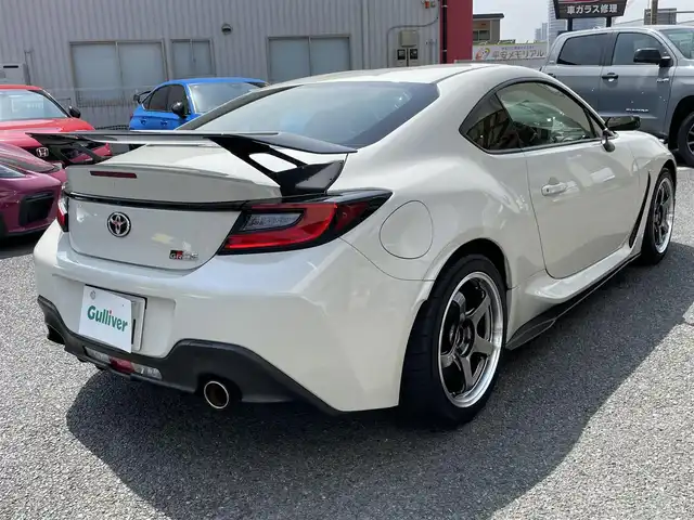 トヨタ ＧＲ８６ RC 神奈川県 2023(令5)年 1.1万km クリスタルホワイトパール ワンオーナー/ADVAN Racing17インチAW/STIサスペンション/VOLTEXカーボンリヤウイング/HKSマフラー/HKSオイルクーラー/ADVICSブレーキキャリパー/OMPステアリング/カーボンミラー/ETC/プッシュスタート/スマートキー×2/保証書・取説あり