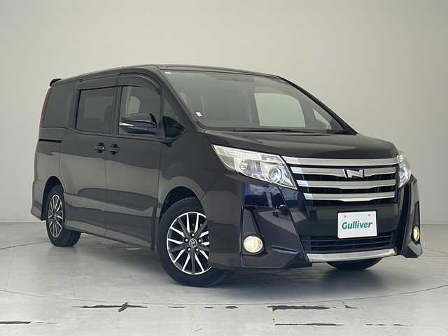 トヨタ ノア Si 沖縄県 2014(平26)年 7.2万km ボルドーマイカメタリック 純正ナビ　【NSZT-W62G】/　(ＣＤ　ＤＶＤ　フルセグＴＶ　Ｂｌｕｅｔｏｏｔｈ)/バックカメラ/両側パワースライドドア/ビルトインＥＴＣ/ドライブレコーダー前方　(DRV-325 ケンウッド)/ＬＥＤヘッドライト/純正16インチアルミホイール/アイドリングストップ/ステアリングスイッチ/ドアバイザー/フロアマット/スペアキー有り