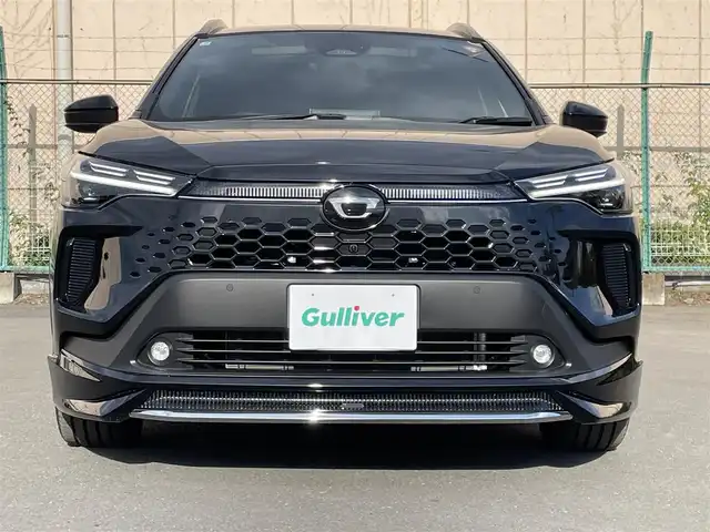 トヨタ カローラ クロス ハイブリッド Z 東京都 2025(令7)年 0.3万km ブラックマイカ ユーザー買取車/純正ナビ/＜フルセグ/AM/FM/BT/Miracast/USB入力端子＞/全周囲カメラ/追従クルコン/ビルトインＥＴＣ２．０/ＬＤＡ/ＢＳＭ/ＰＣＳ/ＰＤＡ/アドバンストパーク/パーキングセンサー/ドライブモード/パワーバックドア/ステアリングヒーター/シートベンチレーション/パワーシート/純正フルエアロ（モデリスタ）/純正AW/純正フロアマット/ヘッドライトレベライザー