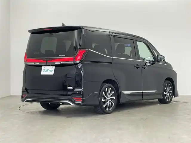 トヨタ ヴォクシー ハイブリッド S－Z 埼玉県 2024(令6)年 1.3万km アティチュードブラックマイカ モデリスタエアロ/10.5インチディスプレイオーディオ/　CD DVD　Bluetooth　AppleCarPlay　フルセグ/14インチフリップダウンモニター/ＡＬＰＩＮＥミラー型ドライブレコーダー/両側パワースライドドア/バックカメラ/レーダークルーズコントロール/ビルトインＥＴＣ２．０/ハーフレザーシート/シートヒーター/コーナーセンサー/オートブレーキホールド/プリクラッシュセーフティ/純正１７インチアルミホイール/社外テールランプ/LEDオートライト