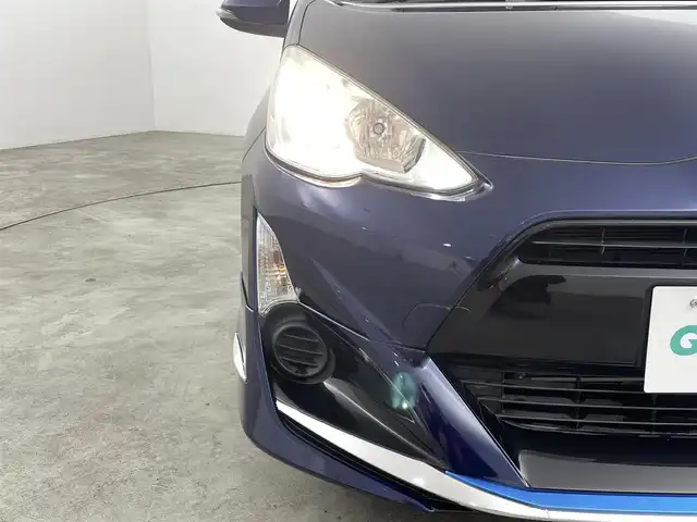 トヨタ アクア 福島県 2016(平28)年 5.1万km ライトブルーメタリック Toyota Safety Sense C/・プリクラッシュセーフティ/・システムレーンディパーチャーアラート/・オートマチックハイビーム/・先行車発進告知機能/純正ナビゲーション/・型式：NSZT-W66T/・Bluetooth/TV/CD/DVD/AM・FM/・バックカメラ/・ETC/モデリスタエアロ/プッシュスタート/・スマートキー/ハロゲンライト/・オートライト/電動格納ウィンカーミラー/・オートミラー/純正フロアマット/ドアバイザー