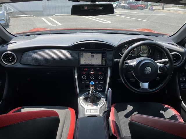 トヨタ ８６ GT 三重県 2016(平28)年 8.9万km オレンジメタリック 6MT/GRフロントポイラー/サイドスカート/TRDエアロスタビライジングカバー/純正ナビ(Bluetooth/CD/DVD/SD/地デジTV/AM/FM)/バックカメラ/ETC/クルーズコントロール/トルセンLSD/LEDクリアランス付LEDヘッドランプ/オートライト/LEDフロントフォグランプ/ダブルステッチ入上級ファブリックシート/左右独立温度調整オートエアコン/スマートエントリー/スタートシステム