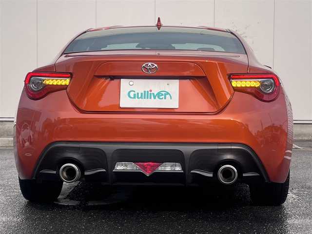 トヨタ ８６ GT 三重県 2016(平28)年 8.9万km オレンジメタリック 6MT/GRフロントポイラー/サイドスカート/TRDエアロスタビライジングカバー/純正ナビ(Bluetooth/CD/DVD/SD/地デジTV/AM/FM)/バックカメラ/ETC/クルーズコントロール/トルセンLSD/LEDクリアランス付LEDヘッドランプ/オートライト/LEDフロントフォグランプ/ダブルステッチ入上級ファブリックシート/左右独立温度調整オートエアコン/スマートエントリー/スタートシステム