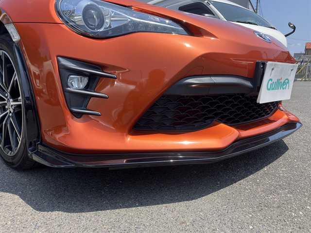 トヨタ ８６ GT 三重県 2016(平28)年 8.9万km オレンジメタリック 6MT/GRフロントポイラー/サイドスカート/TRDエアロスタビライジングカバー/純正ナビ(Bluetooth/CD/DVD/SD/地デジTV/AM/FM)/バックカメラ/ETC/クルーズコントロール/トルセンLSD/LEDクリアランス付LEDヘッドランプ/オートライト/LEDフロントフォグランプ/ダブルステッチ入上級ファブリックシート/左右独立温度調整オートエアコン/スマートエントリー/スタートシステム