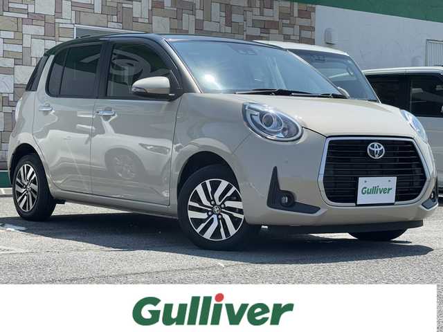 トヨタ パッソ モーダ　Gパッケージ 徳島県 2022(令4)年 1.7万km ブラックマイカメタリック/パウダリーベージュメタリック 2トーン 純正SDナビ　NSCN-W68/　AM/FM/BT/CD/SD/AUX/ワンセグ/ビルトインETC/ドライブレコーダー　TZ-DR210/前後コーナーセンサー/バックカメラ/フォグライト/クリアランスソナー/本革巻きステアリング/純正14インチアルミホイール/純正フロアマット/LEDヘッドライト/オートライト/スマートキー/スペアキー/プッシュスタート/スマートアシスト/新車時保証書/新車時取扱説明書
