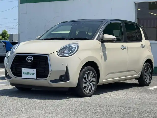 トヨタ パッソ モーダ　Gパッケージ 徳島県 2022(令4)年 1.7万km ブラックマイカメタリック/パウダリーベージュメタリック 2トーン 純正SDナビ　NSCN-W68/　AM/FM/BT/CD/SD/AUX/ワンセグ/ビルトインETC/ドライブレコーダー　TZ-DR210/前後コーナーセンサー/バックカメラ/フォグライト/クリアランスソナー/本革巻きステアリング/純正14インチアルミホイール/純正フロアマット/LEDヘッドライト/オートライト/スマートキー/スペアキー/プッシュスタート/スマートアシスト/新車時保証書/新車時取扱説明書