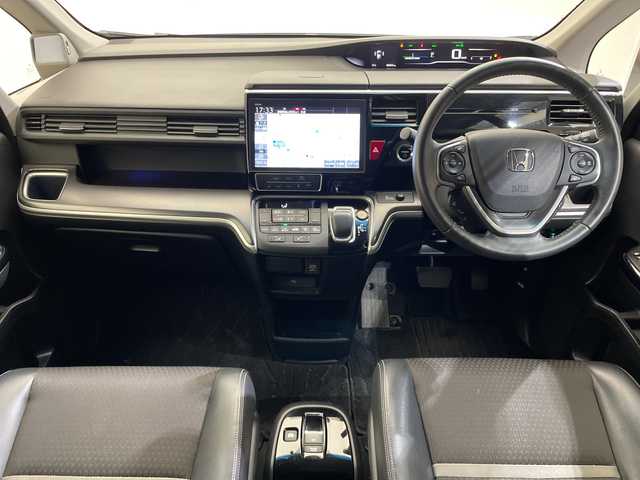 ホンダ ステップワゴン スパーダ eHEV G EXホンダS 愛媛県 2020(令2)年 5.4万km プラチナホワイトパール 純正10インチナビ/フルセグTV/バックカメラ/BT/CD/DVD/USB接続/前後クルコン/ステアリングスイッチ/フォグランプ/ETC2.0/純正前後ドラレコ/ハーフレザーシート/前席シートヒーター/両側パワースライドドア/革巻きステアリング/LEDヘッドライト/オートライト/取扱説明書・保証書