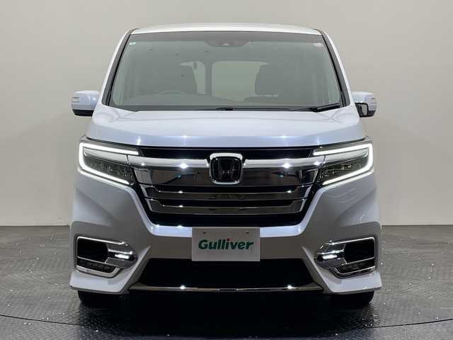 ホンダ ステップワゴン スパーダ eHEV G EXホンダS 愛媛県 2020(令2)年 5.4万km プラチナホワイトパール 純正10インチナビ/フルセグTV/バックカメラ/BT/CD/DVD/USB接続/前後クルコン/ステアリングスイッチ/フォグランプ/ETC2.0/純正前後ドラレコ/ハーフレザーシート/前席シートヒーター/両側パワースライドドア/革巻きステアリング/LEDヘッドライト/オートライト/取扱説明書・保証書