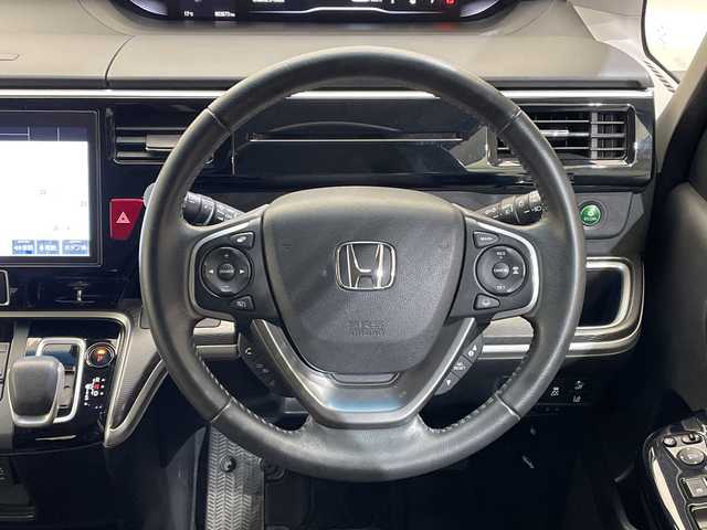 ホンダ ステップワゴン スパーダ eHEV G EXホンダS 愛媛県 2020(令2)年 5.4万km プラチナホワイトパール 純正10インチナビ/フルセグTV/バックカメラ/BT/CD/DVD/USB接続/前後クルコン/ステアリングスイッチ/フォグランプ/ETC2.0/純正前後ドラレコ/ハーフレザーシート/前席シートヒーター/両側パワースライドドア/革巻きステアリング/LEDヘッドライト/オートライト/取扱説明書・保証書