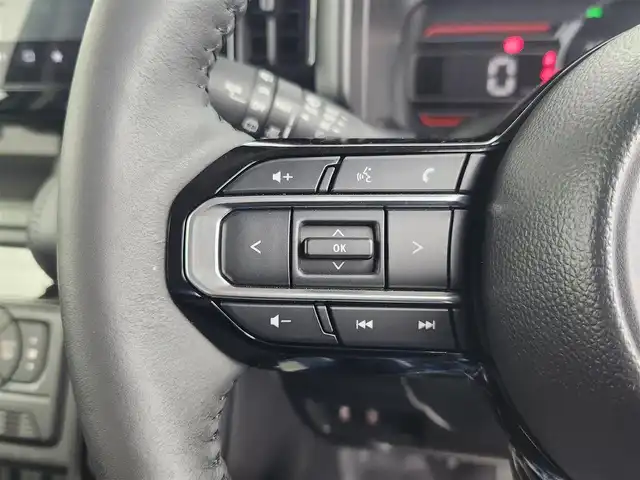 スズキ スペーシア ギア HYBRID XZターボ 愛知県 2024(令6)年 0.2万km モスグレーメタリック 純正9型ナビ（フルセグ、AppleCarplay、Bluetooth）/全方位カメラ/HUD/両側パワスラドア/ACC/電子パーキング/オートホールド/衝突軽減ブレーキ/レーンキープアシスト/LEDヘッドライト/オートハイビーム/シートヒーター（D+N)/ハンドルヒーター/ターボ/スマートキー/オートライト/三点エアバック/フォグライト/電子パーキング/横滑り防止装置
