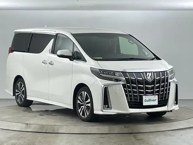 トヨタ アルファード S Cパッケージ 愛知県 2018(平30)年 6.2万km ホワイトパールクリスタルシャイン 純正9.2インチナビ/（Bluetooth/CD/DVD/Blu-ray/フルセグ）/純正フリップダウンモニター/JBLサウンド/Toyota Safety Sense/ レーダークルーズコントロール/ レーントレーシングアシスト/ 前後クリアランスソナー/ パーキングサポートブレーキ/ プリクラッシュセーフティ/ ブラインドスポットモニター/ リヤクロストラフィックアラート/ ロードサインアシスト/ アラウンドビューカメラ/横滑り防止装置/アクセサリーコンセント/デジタルインナーミラー/前方ドライブレコーダー/両側パワースライドドア/電動リアゲート/ステアリングスイッチ/ステアリングヒーター/D席+N席パワーシート/D席+N席+セカンドシートヒーター/D席シートメモリー/オットマン/レザーシート/ウォークスルー/nanoe/ETC2.0/LEDヘッドライト/フォグランプ/オートマチックハイビーム/純正フロアマット