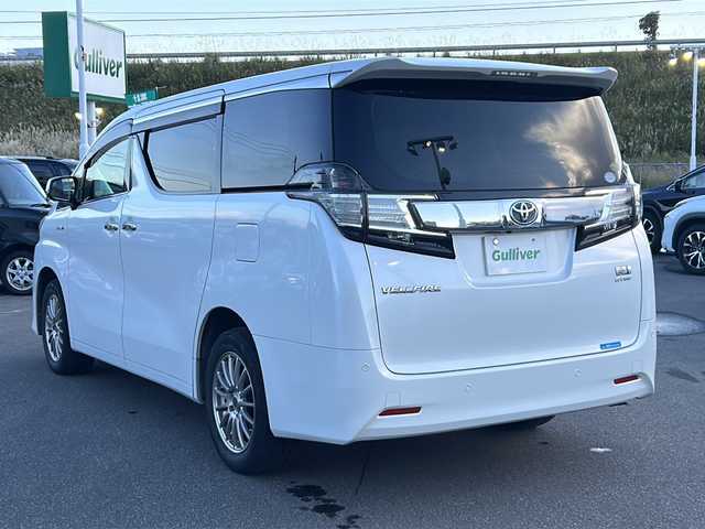 トヨタ ヴェルファイア ハイブリット X 青森県 2015(平27)年 9.1万km ホワイトパールクリスタルシャイン ・純正ナビ/・Bluetooth/・フルセグ/・リアカメラ/・衝突軽減ブレーキ/・クルーズコントロール/・両側パワースライドドア/・ドライブレコーダー/・ETC/・電子制御式パーキングブレーキ/・プッシュスタート/・スマートキー/・オットマン/・社外17AW/・純正LEDヘッドライト
