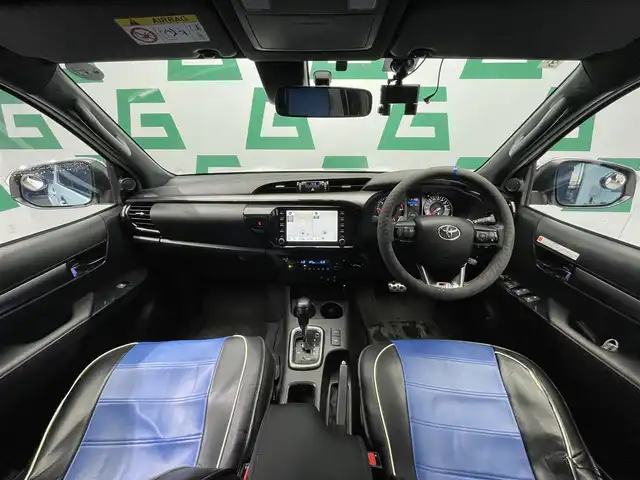 トヨタ ハイラックス Z GRスポーツ 鹿児島県 2023(令5)年 2.4万km スーパーホワイトⅡ 禁煙車　/純正ナビ　/全方位カメラ　/トヨタセーフティセンス　/運転席パワーシート　/前後ドライブレコーダー　/追従型クルーズコントロール　/前後コーナーセンサー　/リアデフロック　/ダウンヒルアシスト/ＥＴＣ　/フロアマット　/ＬＥＤヘッドライト　/オートライト