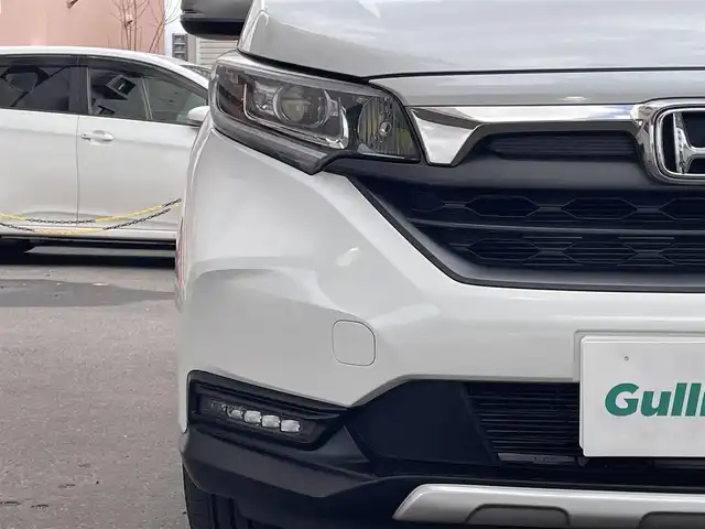 ホンダ フリード ハイブリット クロスター ホンダセンシング 道央・札幌 2021(令3)年 2.1万km プラチナホワイトパール 4WD/純正メモリナビ(フルセグ、FM、AM、CD、DVD、BT、SD)/衝突被害軽減システム/レーダークルーズコントロール/純正フリップダウンモニター/レーンキープアシスト/両側パワースライドドア/バックカメラ/寒冷地仕様/オートライト/シートヒーター(D/N)/純正15インチAW(サマータイヤ)/ルーフレール/社外ドライブレコーダー/ETC/新車時保証書/取扱説明書/スペアキー×1