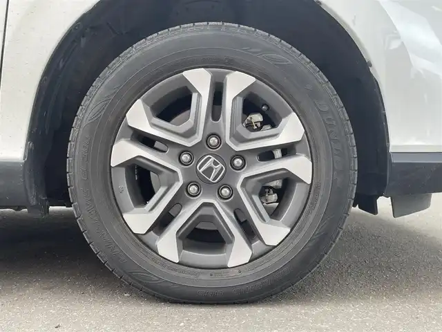 ホンダ フリード ハイブリット クロスター ホンダセンシング 道央・札幌 2021(令3)年 2.1万km プラチナホワイトパール 4WD/純正メモリナビ(フルセグ、FM、AM、CD、DVD、BT、SD)/衝突被害軽減システム/レーダークルーズコントロール/純正フリップダウンモニター/レーンキープアシスト/両側パワースライドドア/バックカメラ/寒冷地仕様/オートライト/シートヒーター(D/N)/純正15インチAW(サマータイヤ)/ルーフレール/社外ドライブレコーダー/ETC/新車時保証書/取扱説明書/スペアキー×1