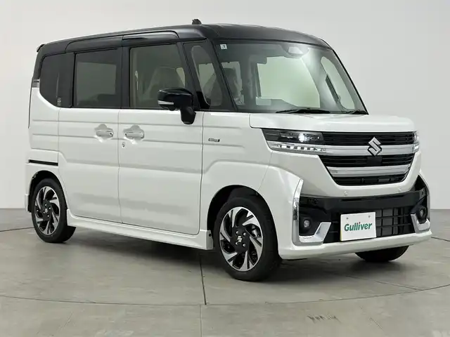 スズキ スペーシア カスタム HYBRID XS 愛知県 2025(令7)年 0.1千km パールⅡ 届出済未使用車/登録時走行距離4km/スズキセーフティサポート/純正メモリナビ/フルセグTV/Bluetooth/AppleCarPlay/AndroidAuto/全方位モニター/前席シートヒーター/革巻きステアリング/ステアリングリモコン/アダプティブクルーズコントロール/ハーフレザーシート/後席サーキュレーター/後席サンシェード/ステアリングヒーター/両側パワースライドドア/ヘッドアップディスプレイ/電動パーキングブレーキ/LEDヘッドライト/フォグランプ