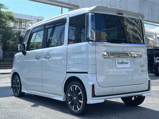 スズキ スペーシア カスタム HYBRID XS ターボ 沖縄県 2022(令4)年 1.2万km ピュアホワイトP 純正8型ナビ　/（ＡＭ／ＦＭ／ＣＤ／ＤＶＤ／ＢＴ）　/全方位モニター　/フルセグＴＶ　/両側パワスラ　/衝突軽減　/ヘッドアップディスプレイ/コーナーセンサー　/レーンキープアシスト　/クルーズコントロール/シートヒーター　/ドラレコ　/オートライト　/ＵＳＢ入力端子/アイドリングストップ/横滑り防止/LEDヘッドライト/ハーフレザー/純正15Aw/スマートキー/純正フロアマット