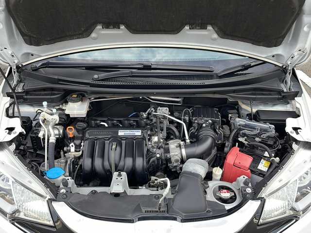 ホンダ フィット ハイブリット Lパッケージ 富山県 2016(平28)年 2.4万km プレミアムホワイトパールⅡ 禁煙車/純正ナビ/バックカメラ/フルセグTV/クルーズコントロール/電動格納ミラー/前後コーナーセンサー/プッシュスタート/スマートキー/スペアキー/アイドリングストップ/ETC/純正フロアマット/LEDヘッドライト/ハーフレザーシート/横滑り防止装置/盗難防止装置