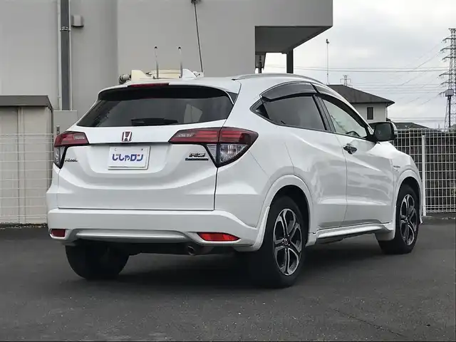 ホンダ ヴェゼル ハイブリッド Z 栃木県 2014(平26)年 10.3万km ホワイトオーキッドパール (株)IDOMが運営する【じしゃロン小山店】の自社ローン対象車両になります。こちらは現金ご利用時の価格です。/自社ローンご希望の方は別途その旨お申付け下さい。//禁煙車/純正フルセグナビ/（CD/DVD/AM/FMラジオ）/(Bluetooth)/スマートキー/プッシュスタート/バックカメラ/ＥＴＣ/クルーズコントロール/シティブレーキアクティブシステム/ルーフレール/シートヒーター/チップアップシート/ステアリングリモコン/電動格納ドアミラー/パワーウインドウ/オートライト/自動防眩ミラー