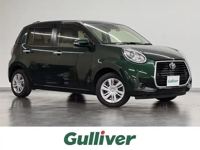 トヨタ パッソ モーダ　チャーム 三重県 2021(令3)年 3.8万km ブラックマイカメタリック/ダークエメラルドマイカ 2トーン ガソリン/FF/インパネCVT/純正 7インチナビ NSCN-W68/（AM/FM/CD/SD/地デジTV/Bluetooth/AUX）/パノラマモニター/ドライブレコーダー 前後/ビルトイン ETC/衝突回避支援機能 スマートアシスト3/・衝突回避支援ブレーキ機能（対車両・対歩行者）/・衝突警報機能（対車両・対歩行者）/・車線逸脱警報機能誤発進抑制制御機能（前方・後方）/・誤発進抑制制御機能（前方・後方）/・コーナーセンサー（フロント４個／リヤ４個、接近お知らせ表示付）/など/装備/・ハーフレザーシート/・シートヒーター（D）/・LEDヘッドライト & LEDクリアランスランプ/・オートライトシステム/・オートハイビーム機能/・オートエアコン/・ステアリングスイッチ/・プッシュスタート/・スマートキーx2/・純正ホイールキャップ＆14インチスチールホイール/・保/取/など