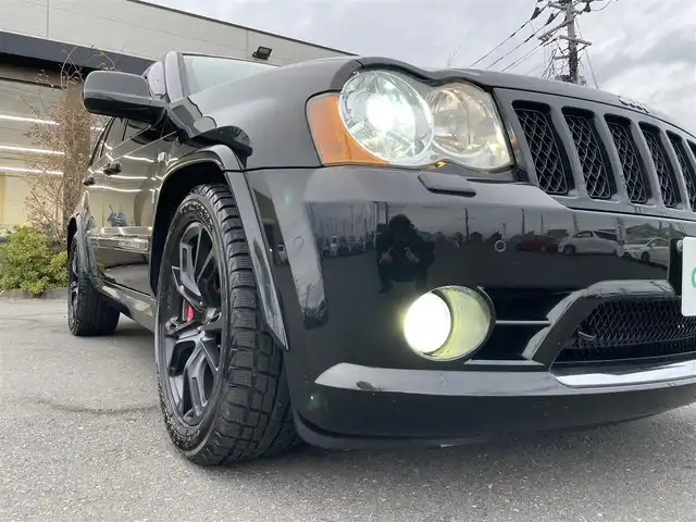 クライスラー・ジープ ジープ グランドチェロキー SRT8 宮城県 2010(平22)年 6.7万km 黒 4WD/WAC/運転席エアバッグ/助手席エアバッグ/ピラーサイドカーテン/Bluetooth/ミュージックサーバー/フルセグテレビ/バックカメラ/サイドカメラ/サンルーフ/コーナーセンサー/レザーシート（ハーフレザー）/シートヒーター/プライバシーガラス/電格ミラー/オートライト/純正ドアバイザー/社外20インチアルミホイール/ABS