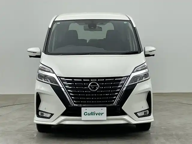 日産 セレナ ハイウェイスター V 千葉県 2021(令3)年 0.9万km ブリリアントホワイトパール 純正9インチメモリナビ/　AM/FM/CD/DVD/BT/フルセグ/アラウンドビューモニター/エマージェンシーブレーキ/レーンキープアシスト/ブラインドスボットモニター/デジタルインナーミラー/両側パワースライドドア/プロパイロット/横滑り防止装置/アイドリングストップ/電子パーキング/オートホールド/プッシュスタート＆スマートキー/電動格納ミラー/ステアリングスイッチ/革巻きステアロング/LED/フォグランプ/純正16インチアルミホイール