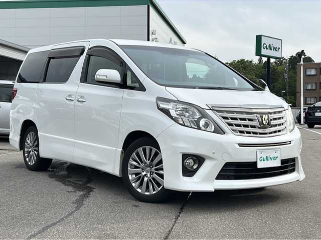 トヨタ アルファード 240S タイプゴールドⅡ 石川県 2014(平26)年 11.3万km ホワイトパールクリスタルシャイン ワンオーナー/4WD/純正HDDナビゲーション/【CD・DVD・Bluetooth・HDD・フルセグTV】/型番：NHZN-X62G/両側パワースライドドア/電動リアゲート/ALPINEリアモニター/クルーズコントロール/センターデフロック/コーナーセンサー/エンジンスターター/バックカメラ/ビルトインETC/オットマン/100V電源/プッシュスタート/・スマートキー/・スペアキー/サイド・リアカーテン/電装格納ミラー/HIDヘッドライト/・オートライト/・フォグランプ/純正フロアマット/ドアバイザー/記録簿/取扱説明書/保証書