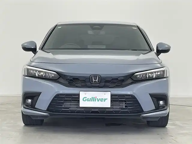 ホンダ シビック EX 群馬県 2022(令4)年 3.6万km ソニックグレーパール 純正9型ディスプレイオーディオ/(AM/FM/Bluetooth/フルセグTV//USB/AppleCarPlay/AndroidAuto)/バックモニター/BOSEサウンドシステム/ワイヤレス充電器/10.2インチデジタルグラフィックメーター/LEDアクティブコーナリングライト/LEDフォグライト/Honda SENSING/ ・衝突軽減ブレーキ/近距離衝突軽減ブレーキ/ ・歩行者事故低減ステアリング/ ・路外逸脱抑制機能/ ・渋滞追従機能付アダプティブクルーズコントロール/ ・車線維持支援システム/ ・先行車発進お知らせ機能/ ・標識認識機能/ ・オートハイビーム/ ・アダプティブドライビングビーム/ ・ブラインドスポットインフォメーション/ ・パーキングセンサーシステム/ ・後退出庫サポート/ ・誤発進抑制機能/後方誤発進抑制機能/ ・トラフィックジャムアシスト/前席パワーシート/前席シートヒーター/ビルトインETC2.0/電動パーキングブレーキ/オートブレーキホールド/プッシュスタート/スマートキー/スペアキー有