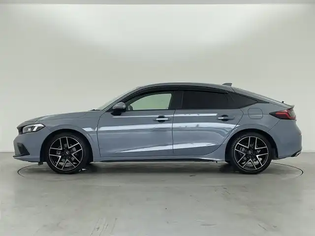 ホンダ シビック EX 群馬県 2022(令4)年 3.6万km ソニックグレーパール 純正9型ディスプレイオーディオ/(AM/FM/Bluetooth/フルセグTV//USB/AppleCarPlay/AndroidAuto)/バックモニター/BOSEサウンドシステム/ワイヤレス充電器/10.2インチデジタルグラフィックメーター/LEDアクティブコーナリングライト/LEDフォグライト/Honda SENSING/ ・衝突軽減ブレーキ/近距離衝突軽減ブレーキ/ ・歩行者事故低減ステアリング/ ・路外逸脱抑制機能/ ・渋滞追従機能付アダプティブクルーズコントロール/ ・車線維持支援システム/ ・先行車発進お知らせ機能/ ・標識認識機能/ ・オートハイビーム/ ・アダプティブドライビングビーム/ ・ブラインドスポットインフォメーション/ ・パーキングセンサーシステム/ ・後退出庫サポート/ ・誤発進抑制機能/後方誤発進抑制機能/ ・トラフィックジャムアシスト/前席パワーシート/前席シートヒーター/ビルトインETC2.0/電動パーキングブレーキ/オートブレーキホールド/プッシュスタート/スマートキー/スペアキー有