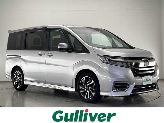 ホンダ ステップワゴン スパーダ クルスピセンシング 宮崎県 2018(平30)年 3.6万km スーパープラチナメタリック 禁煙車/純正9型プレミアムインターナビTV/（VXM-187VFNi/CD/DVD/Bluetooth/フルセグTV）/純正バックカメラ/純正ドライブレコーダー/純正LEDオートライト/純正LEDフォグ/純正17インチアルミ/純正エアロ/純正ルーフエンドスポイラー/純正ラバーマット/両側電動スライドドア/アダプティブクルーズコントロール/レーンディパーチャーアラート/ウインカードアミラー/前席シートヒーター/デュアルオートエアコン/リアオートエアコン/ハーフレザーシート/パドルシフト/本革巻ハンドル/スマートキー/プッシュエンジンスタート/新車時保証書/取扱い説明書