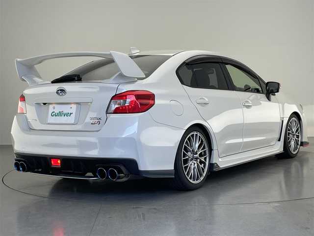 スバル ＷＲＸ Ｓ４ 2．0GT‐S アイサイト 愛知県 2015(平27)年 8.8万km クリスタルホワイトP 純正ナビ　フルセグＴＶ　ＳＴｉスポイラー　大型リヤスポイラー付　ＨＫＳ車高調　Ｇｒｅｄｄｙ４本出マフラー　アイサイト　衝突軽減　追従クルコン　ＢＳＭ　ＬＥＤオートライト　フォグ　ハーフレザー　純正マフラー積込　ETC　プッシュスタート　バックカメラ　サイドカメラ　前席パワーシート　純正18インチアルミ　禁煙車