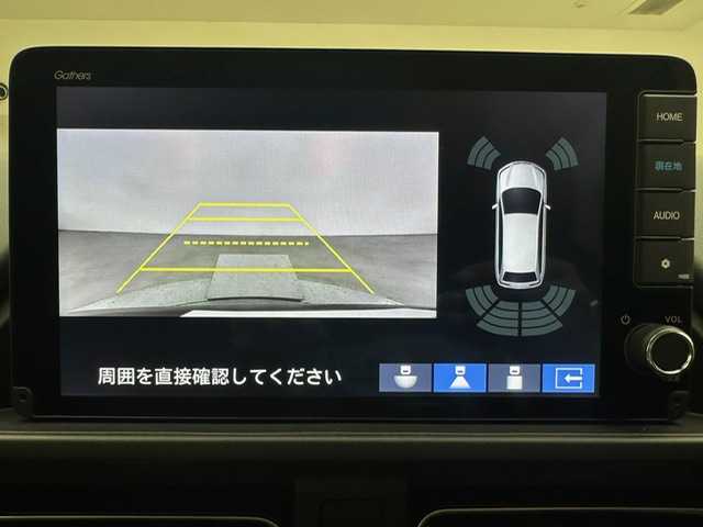 ホンダ フリード ハイブリット e:HEV クロスター 兵庫県 2025(令7)年 0.1千km ガンＭ 登録済み未使用車/純正9インチナビ/(LXM-242ZFNI)/フルセグ BT USB/Apple Car Play android Auto/レーダークルーズコントロール/衝突軽減ブレーキ/BSI/レーンキープアシスト/踏み間違い防止/パーキングセンサー/ハーフレザーシート/シートヒーター/LEDヘッドライト/LEDフォグライト/オートライト/電子パーキング/BREAK HOLD/スマートキー/スペアキー