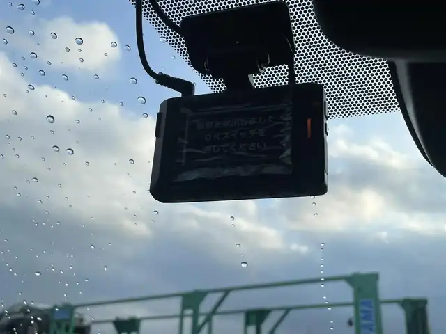 トヨタ ヴォクシー S－Z 熊本県 2024(令6)年 1.5万km グリッターブラックガラスフレーク 快適利便high/ユニバーサルステップ/純正ディスプレイオーディオPlus/・ナビキット/・AM/FM/CD/DVD/BT/・アップルカープレイ/アンドロイドオート/・バックカメラ/・フルセグTV/・テレビキャンセラー/フリップダウンモニター/トヨタセーフティセンス/・プリクラッシュセーフティ/・レーンディパーチャーアラート/・レーダークルーズコントロール/・プロアクティブドライビングアシスト/・ロードサインアシスト/・オートマチックハイビーム/パーキングサポートブレーキ/ハーフレザーシート/・前後席シートヒーター/電動リアゲート/両側電動スライドドア/前後ドライブレコーダー/LEDヘッドライト/ETC2.0/電動パーキングブレーキ/オートホールドブレーキ/後席ロールサンシェード/電動格納ミラー/ウインカーミラー/スペアキー