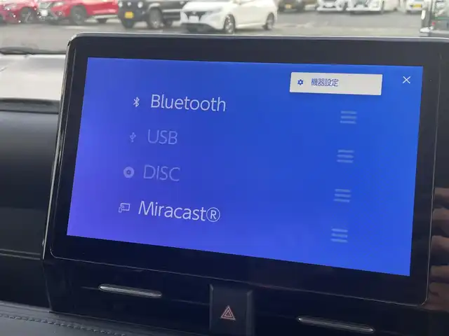 トヨタ ヴォクシー S－Z 熊本県 2024(令6)年 1.5万km グリッターブラックガラスフレーク 快適利便high/ユニバーサルステップ/純正ディスプレイオーディオPlus/・ナビキット/・AM/FM/CD/DVD/BT/・アップルカープレイ/アンドロイドオート/・バックカメラ/・フルセグTV/・テレビキャンセラー/フリップダウンモニター/トヨタセーフティセンス/・プリクラッシュセーフティ/・レーンディパーチャーアラート/・レーダークルーズコントロール/・プロアクティブドライビングアシスト/・ロードサインアシスト/・オートマチックハイビーム/パーキングサポートブレーキ/ハーフレザーシート/・前後席シートヒーター/電動リアゲート/両側電動スライドドア/前後ドライブレコーダー/LEDヘッドライト/ETC2.0/電動パーキングブレーキ/オートホールドブレーキ/後席ロールサンシェード/電動格納ミラー/ウインカーミラー/スペアキー