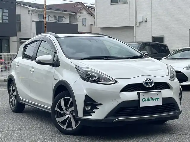 トヨタ アクア クロスオーバー 兵庫県 2018(平30)年 7.2万km ホワイトパールクリスタルシャイン ワンオーナー/プリクラッシュセーフティ/レーンディパーチャーアラート/純正SDナビ/地デジTV/　純正CD/DVD/Bluetooth/SD/【NSZT-W68T】/バックカメラ/ハーフレザーシート/前方ドライブレコーダー/純正16インチアルミ/スマートキー/運転席シートリフター/革巻きステアリング/電格ウィンカーミラー/純正フロアマット/ETC2.0/スペアキー（スマートキー）/保証書/取扱説明書/ナビ取扱説明書