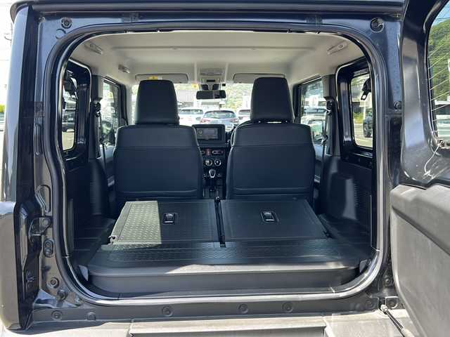 スズキ ジムニー XC 福岡県 2022(令4)年 2.3万km ブルーイッシュブラックパール3 社外メモリナビ/（AM/FM/CD/DVD/BT/フルセグTV）/クルーズコントロール/シートヒーター/背面タイヤ/衝突被害軽減システム/横滑り防止装置/シートカバー有/アイドリングストップ/プッシュスタートボタン/スマートキー/純正LEDヘッドライト/純正１６インチアルミホイール/フロアマット/盗難防止装置/ETC